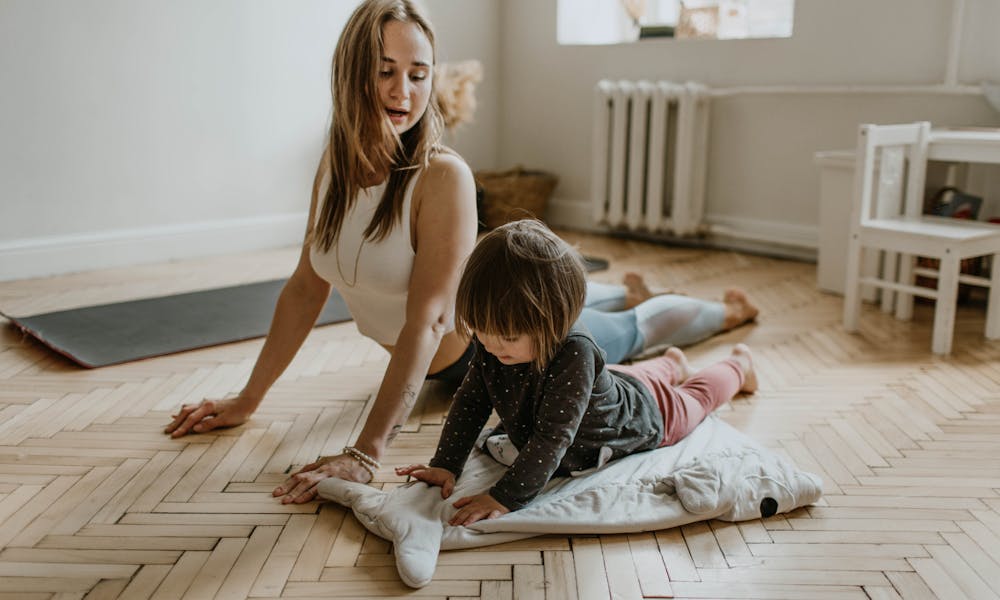 mother and daughter exercising